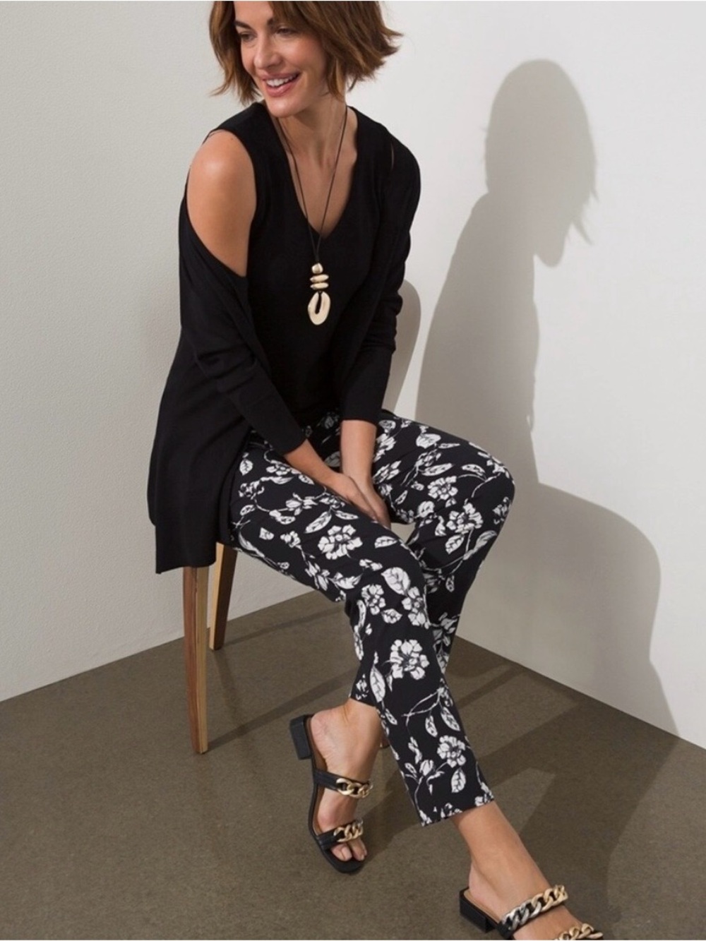 Chico’s | Black Floral Print Slim Ankle Pants